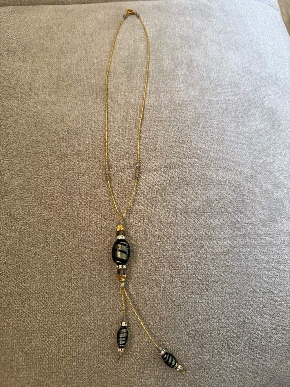 Gold-Tone Lariat Necklace with Black Striped Beads